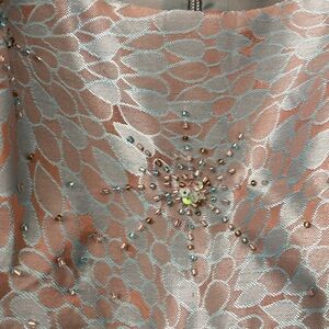 Women’s dress with beading accents on top